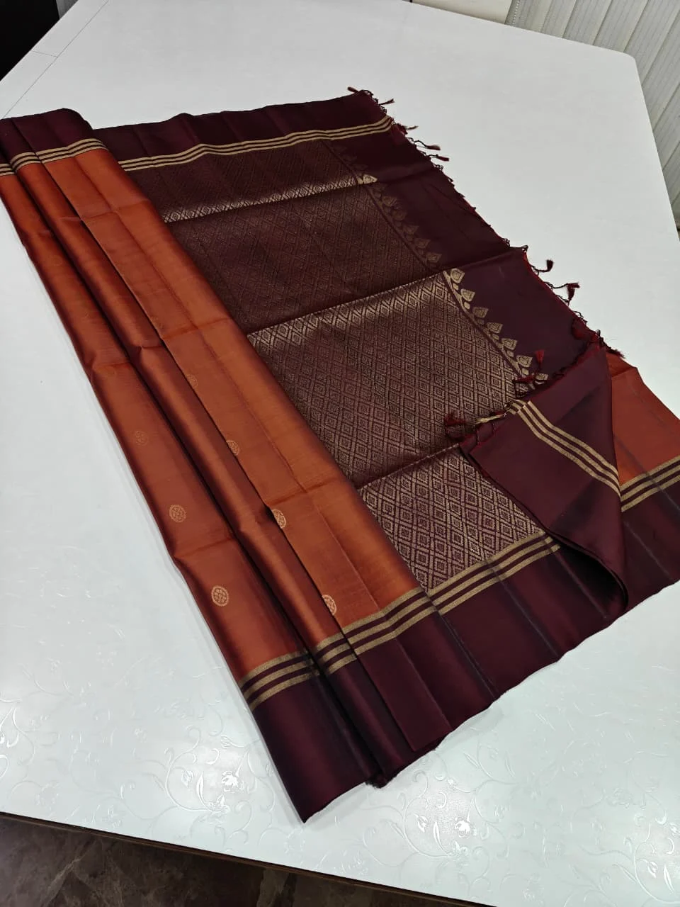 Rust Orange and Maroon Soft Silk with Round Coin Butta and Triple Gold Stripe Border Saree